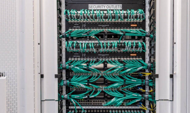 NRG Services team showcasing complex commercial communications integration at Warwick Police Station and Watchhouse.